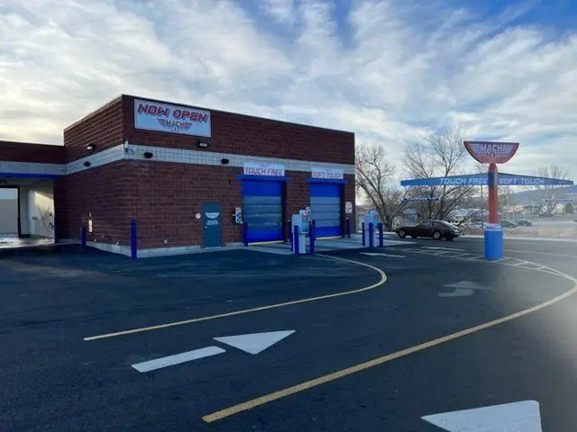 A car wash with an open sign