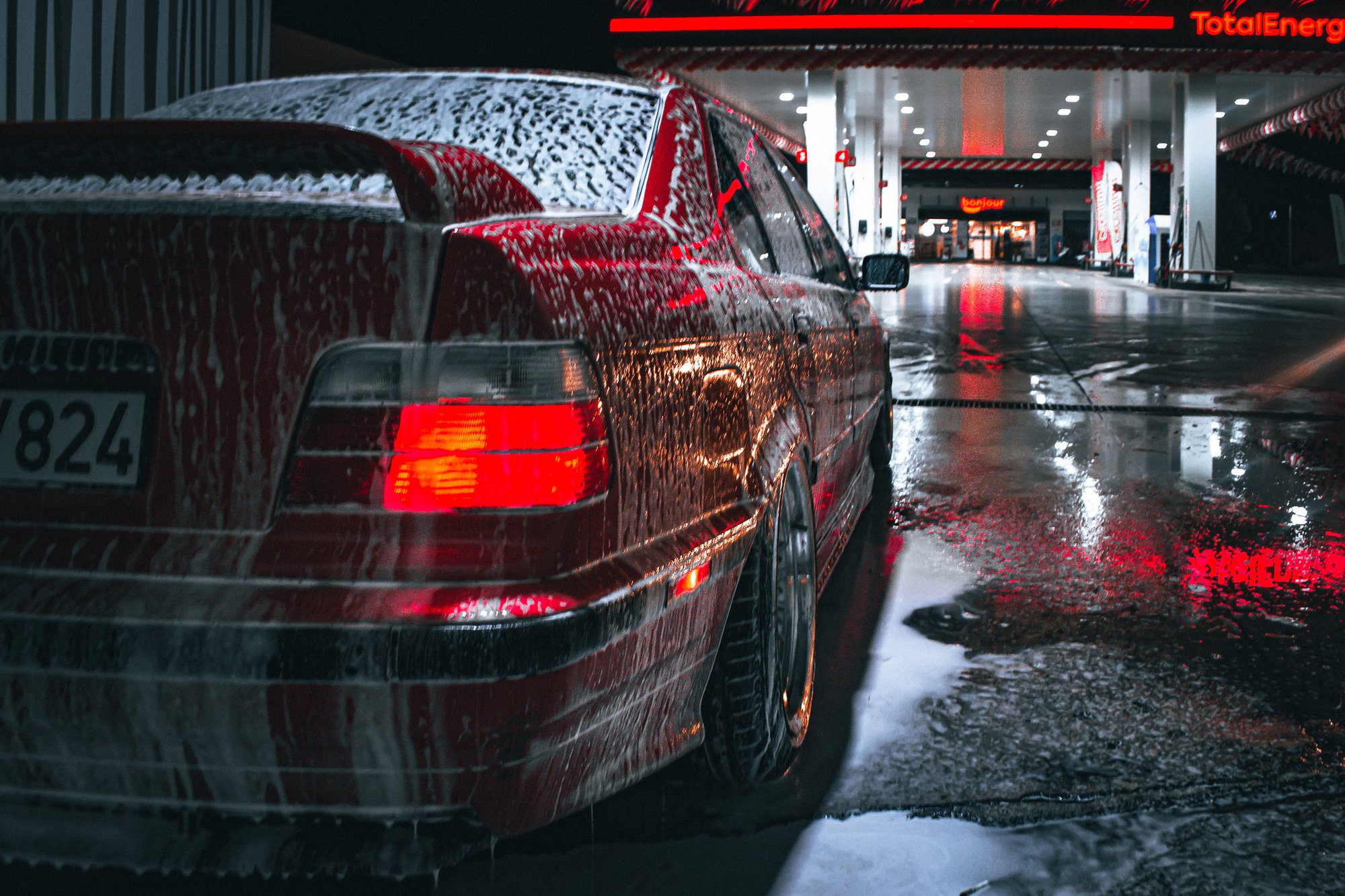 A car ready to go into a car wash